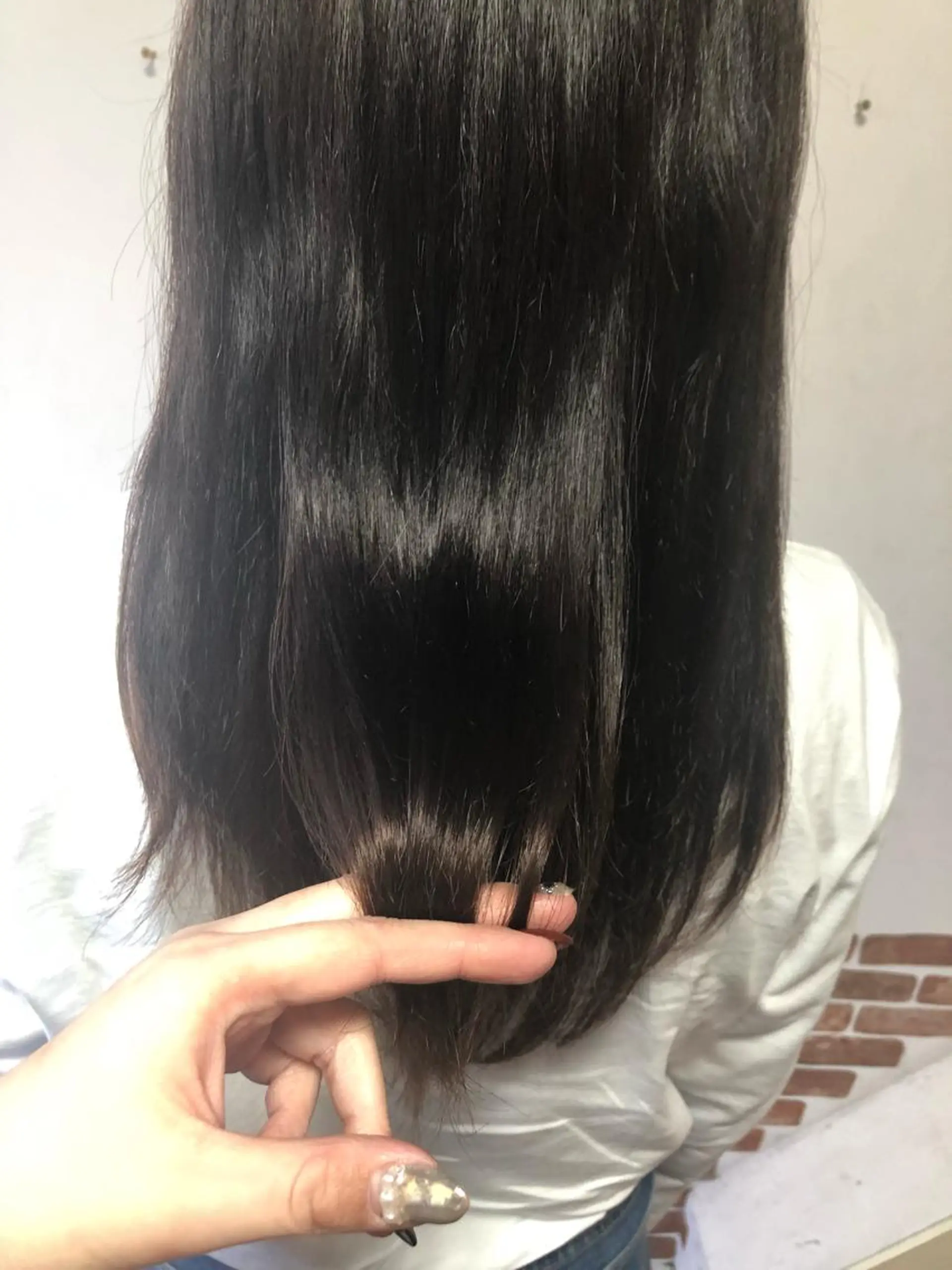 ミディアム 縮毛矯正 ハピネスフィール所属・江藤 菜緒里のヘアスタイル