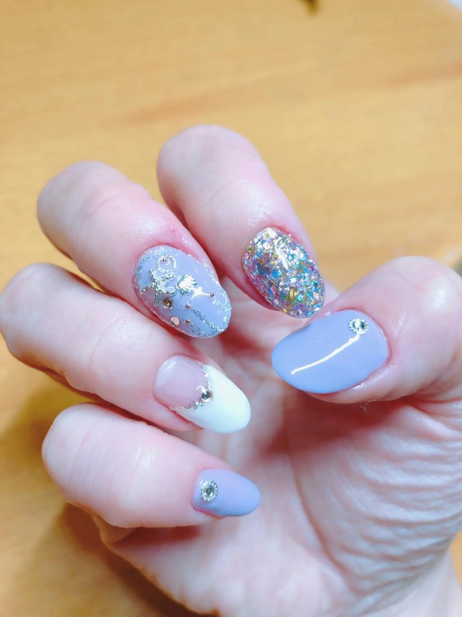 ネイル ジェルネイル キラキラネイル パープル ネイルチップ WELINA nail salonのエステ・リラクイメージ