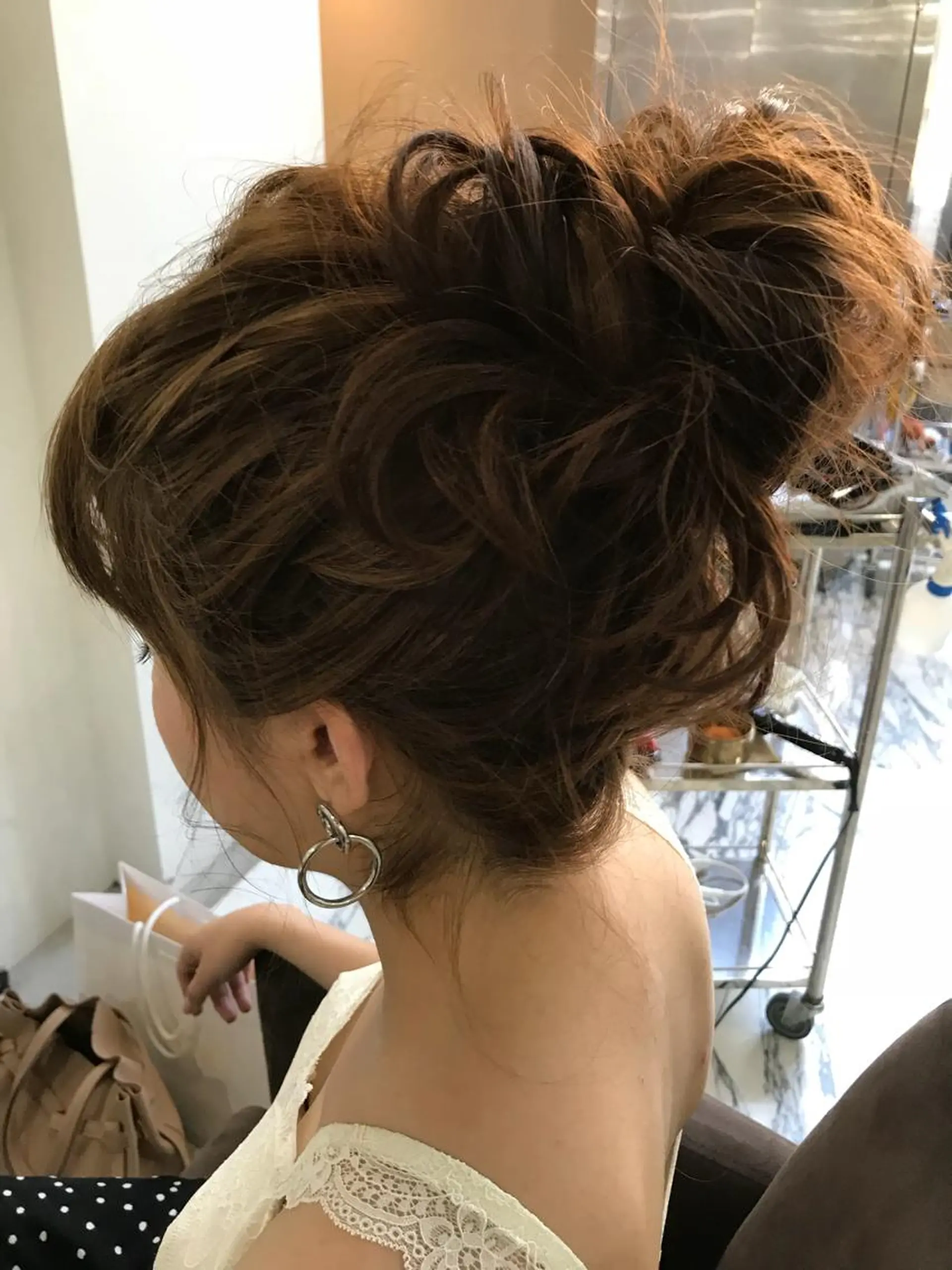 ロング ヘアアレンジ お団子ヘア エクステ(レミー毛) NINEのヘアスタイル