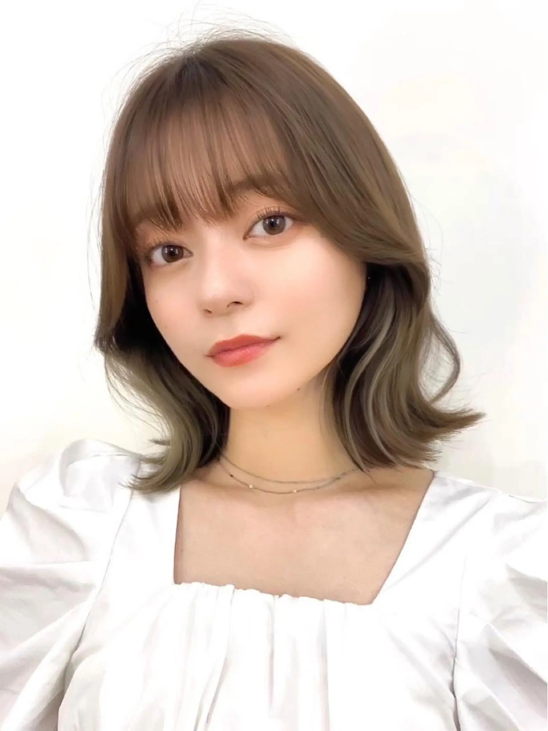 ミディアム カラー パーマ ヘアアレンジ 切りっぱなしボブ アディクシーカラー ブリーチ 透明感カラー イルミナカラー カット ヘアカラー トリートメント ヘアセット 小野寺瑞希 /最小顔カットのヘアスタイル