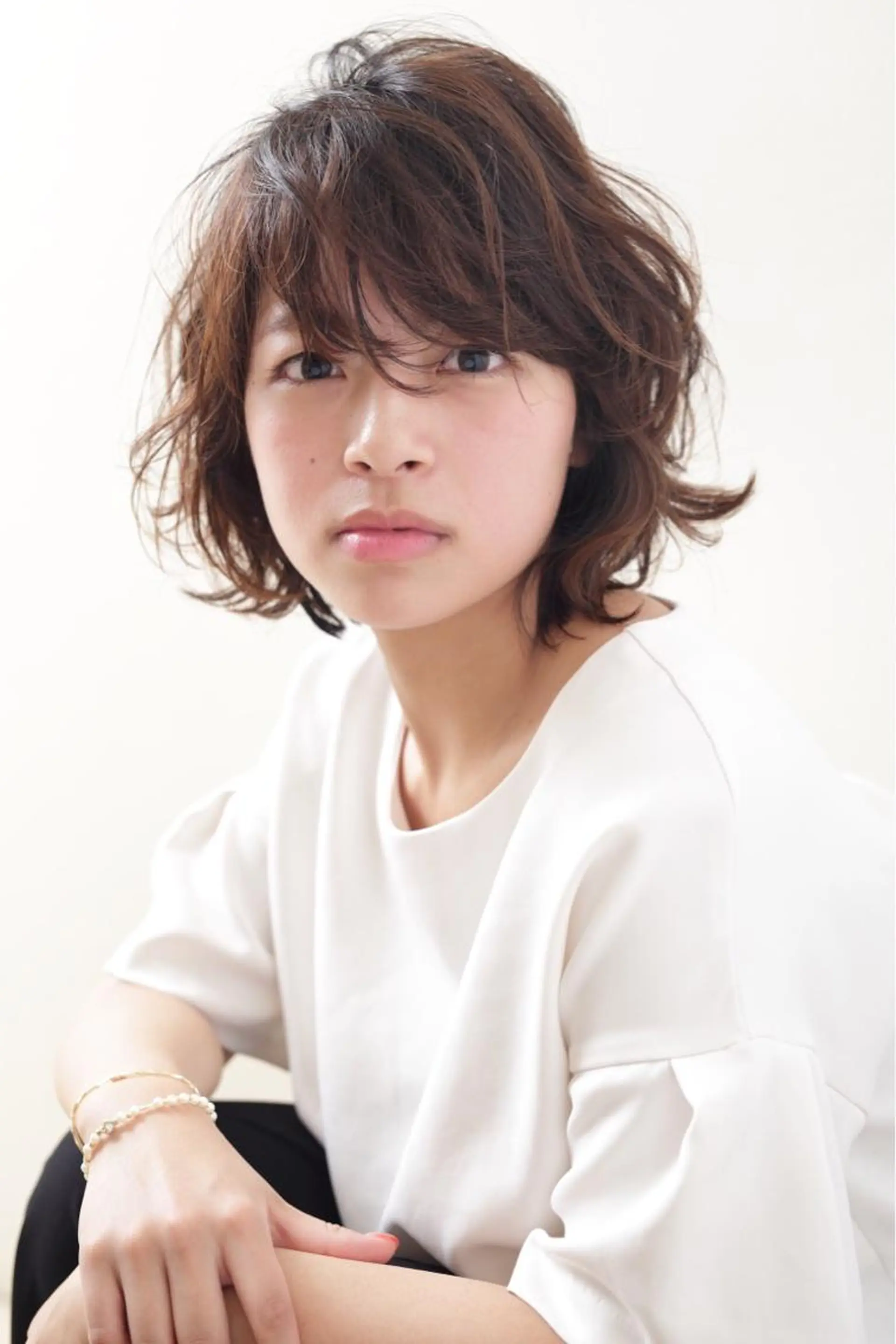 ショート ミディアム パーマ ヘアアレンジ 前下がりボブ ミディアムパーマ ボブ ReMix 新宿店所属・タジマ ヤスヒサのヘアスタイル