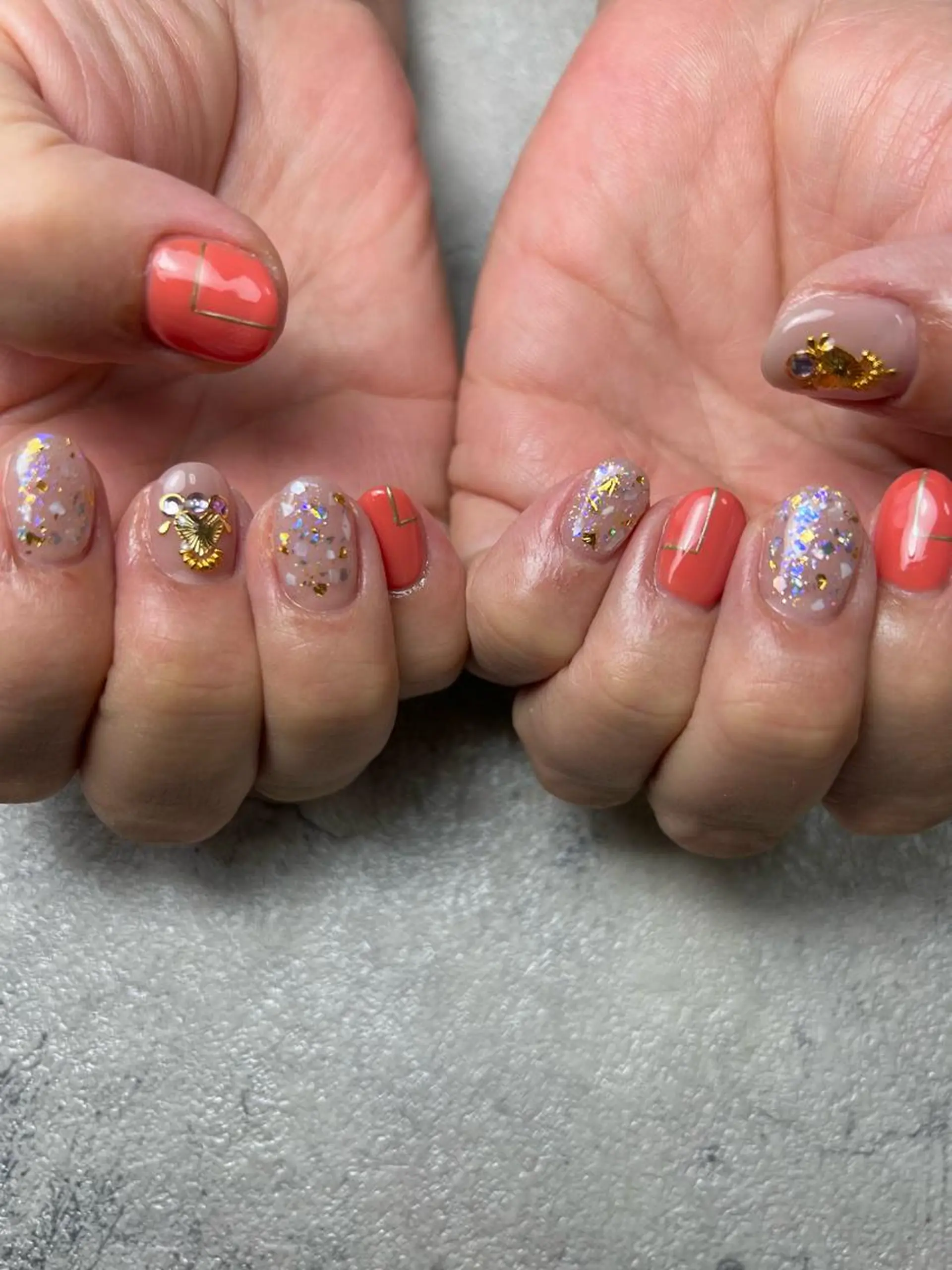 ネイル ジェルネイル キラキラネイル ラメ(グリッター) 持ち込み オレンジ ハンドネイル flowers nailのネイルデザイン
