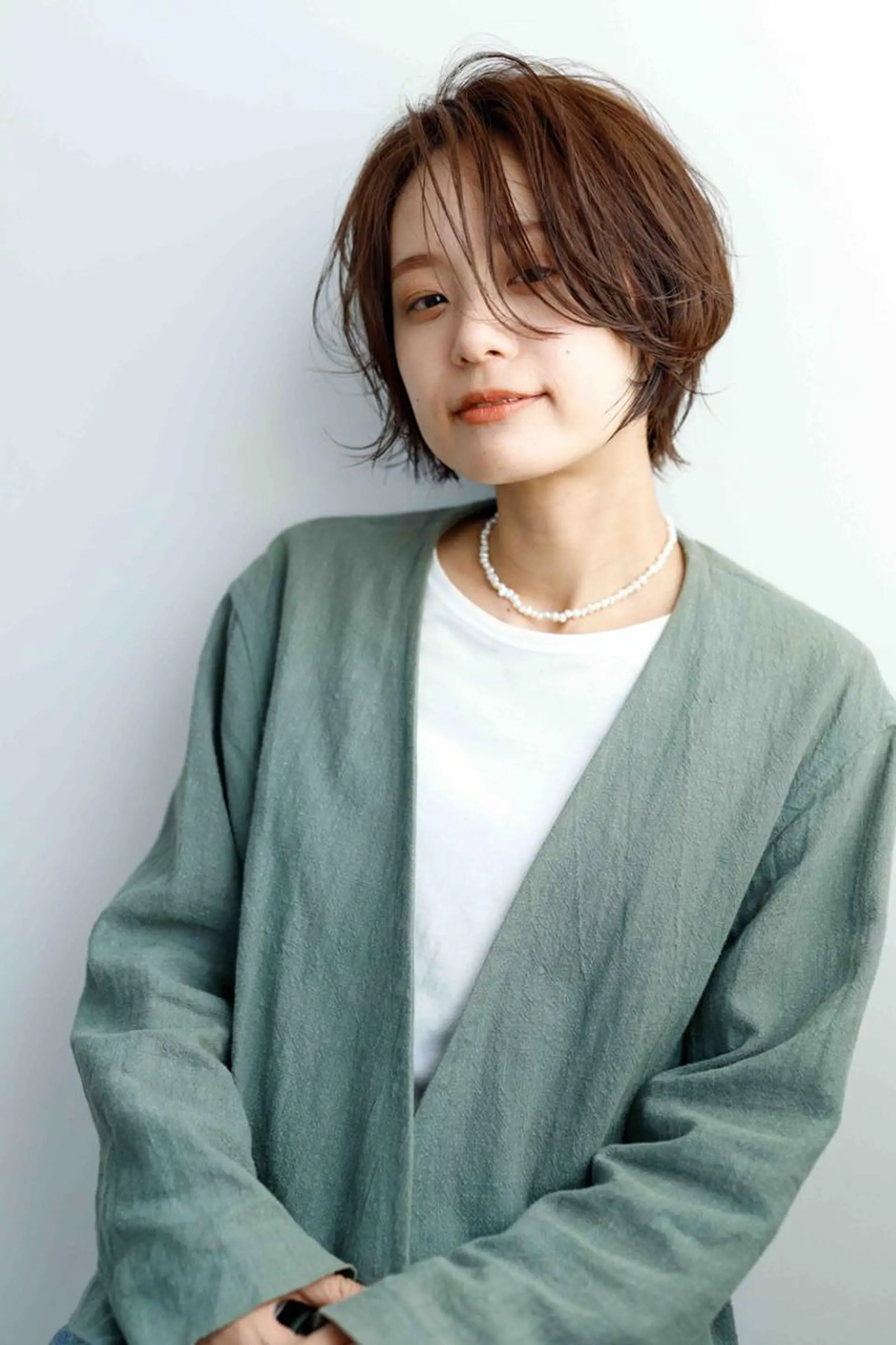 ショート カラー パーマ アディクシーカラー ベージュカラー ケアカラー 透明感カラー イヤリングカラー カット ヘアカラー トリートメント ヘアケア特化型サロン newi 京橋のヘアスタイル