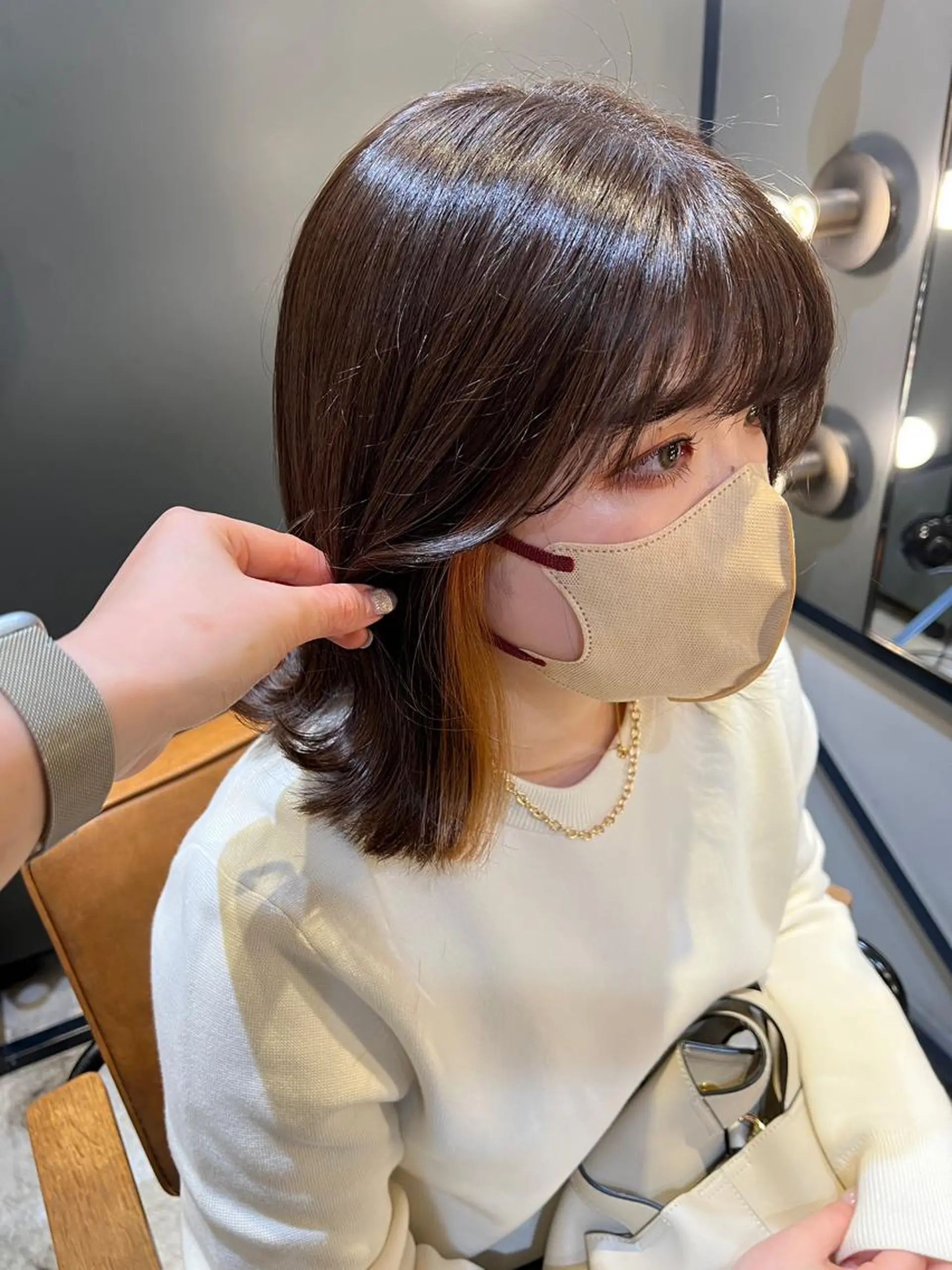 ミディアム カラー オレンジ ノイシキ サキのヘアスタイル