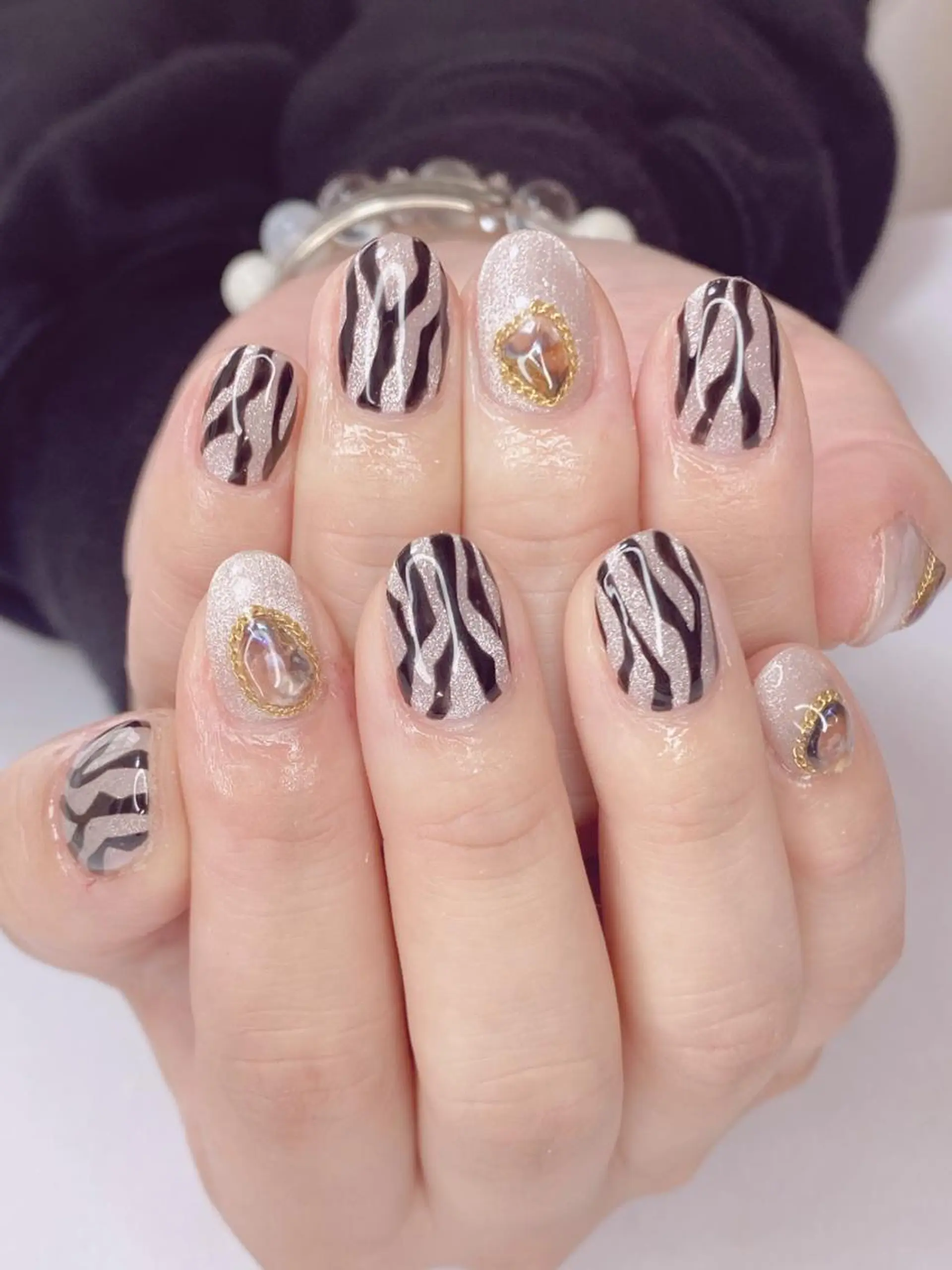 ネイル アニマル柄 アートネイル オーロラネイル 桜ネイル クリアネイル Nail Salon ertiのネイルデザイン