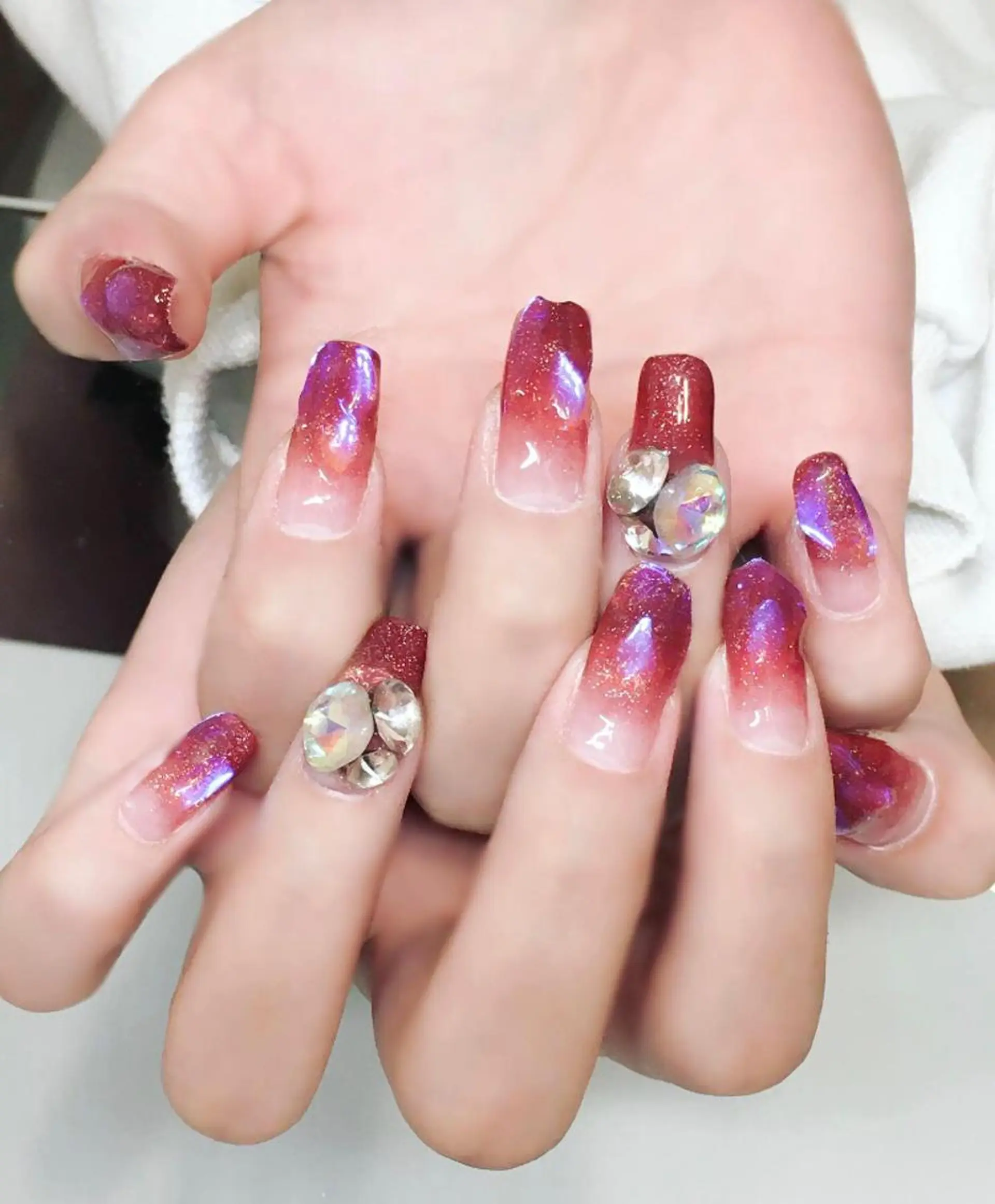 ネイル ジェルネイル グラデーション 氷ネイル・うるうるネイル キラキラネイル 赤色 Nyanco Nailのネイルデザイン