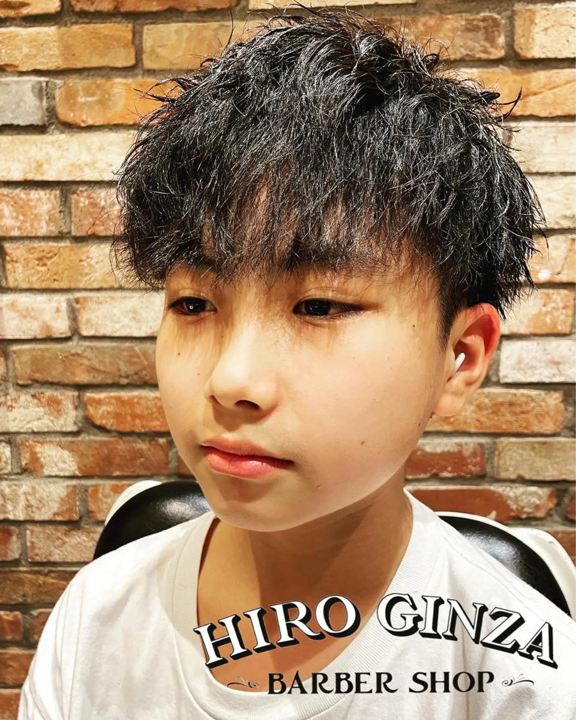 ミディアム パーマ ヘアアレンジ メンズ ミディアムパーマ メンズパーマ ツイストスパイラルパーマ スパイラルパーマ ヒロ銀座BARBERSHOP丸の内店所属・ヒロ銀座　石川 昂のヘアスタイル