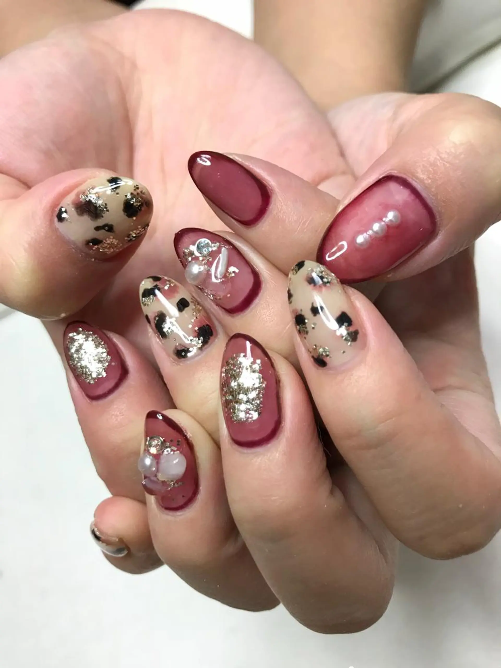 ロング カラー パーマ ヘアアレンジ ネイル マツエク・マツパ アニマル柄 Sunny side nailのネイルデザイン