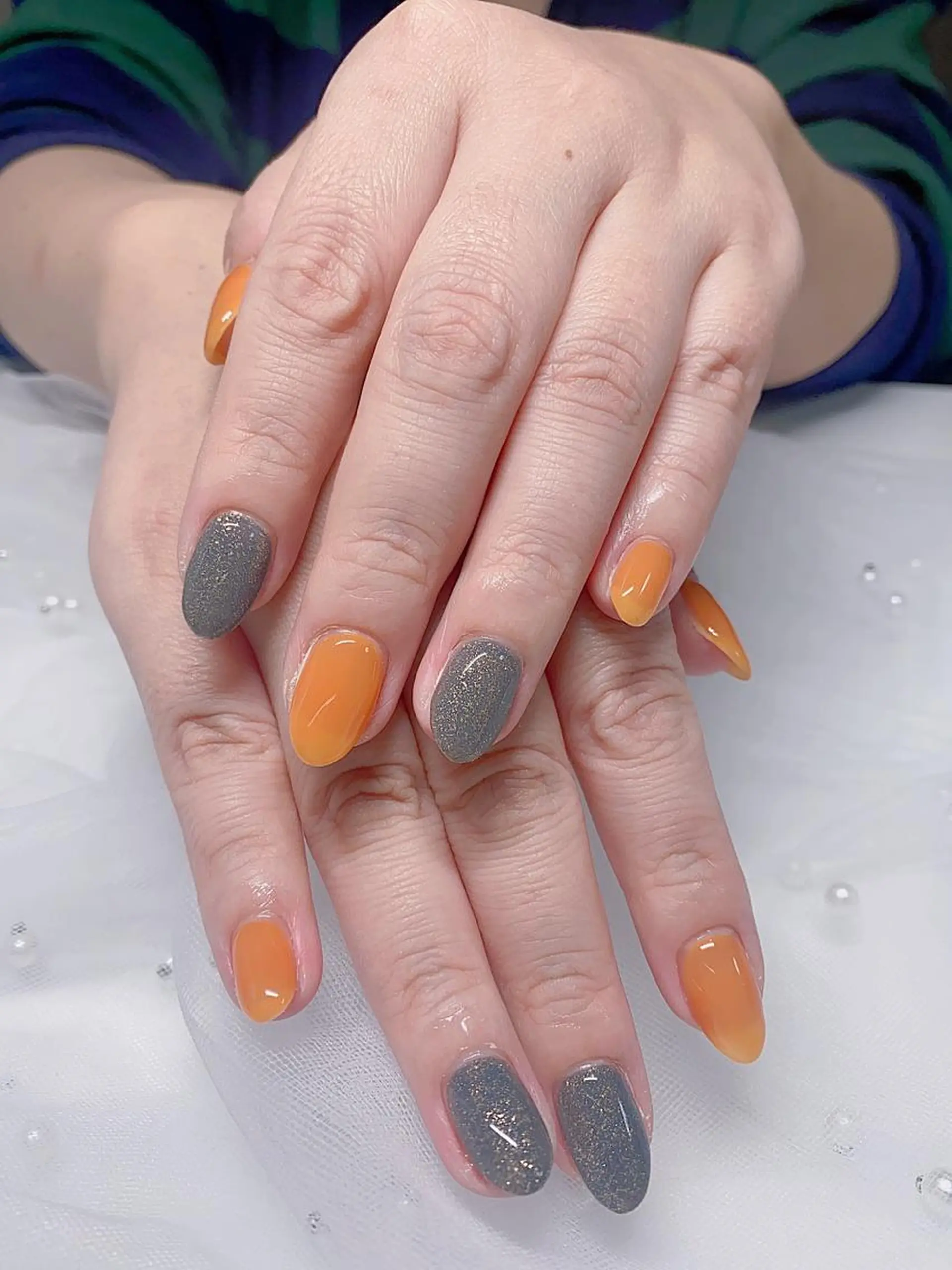 ネイル ラメ(グリッター) オレンジ Jasmine nailsalon所属・ジャスミン ネイルサロンのネイルデザイン