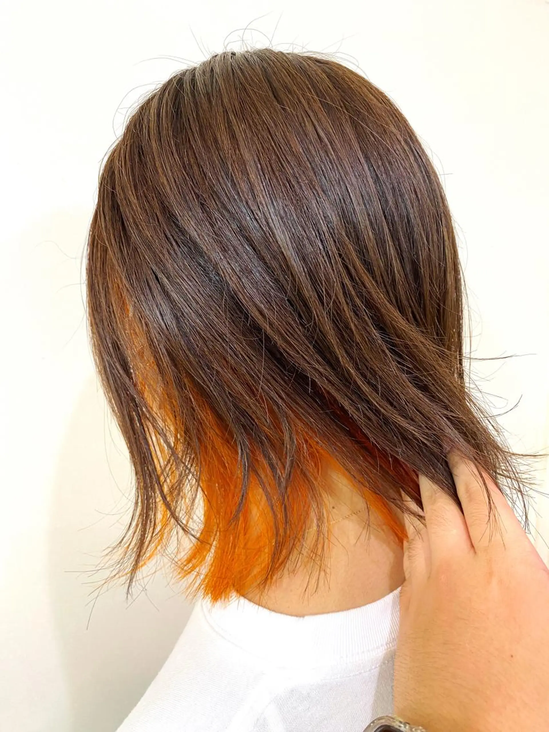 ミディアム カラー インナーカラー オレンジ ボブ 外ハネヘア ヘアカラー Ricci小針店所属・小池 隼人のヘアスタイル