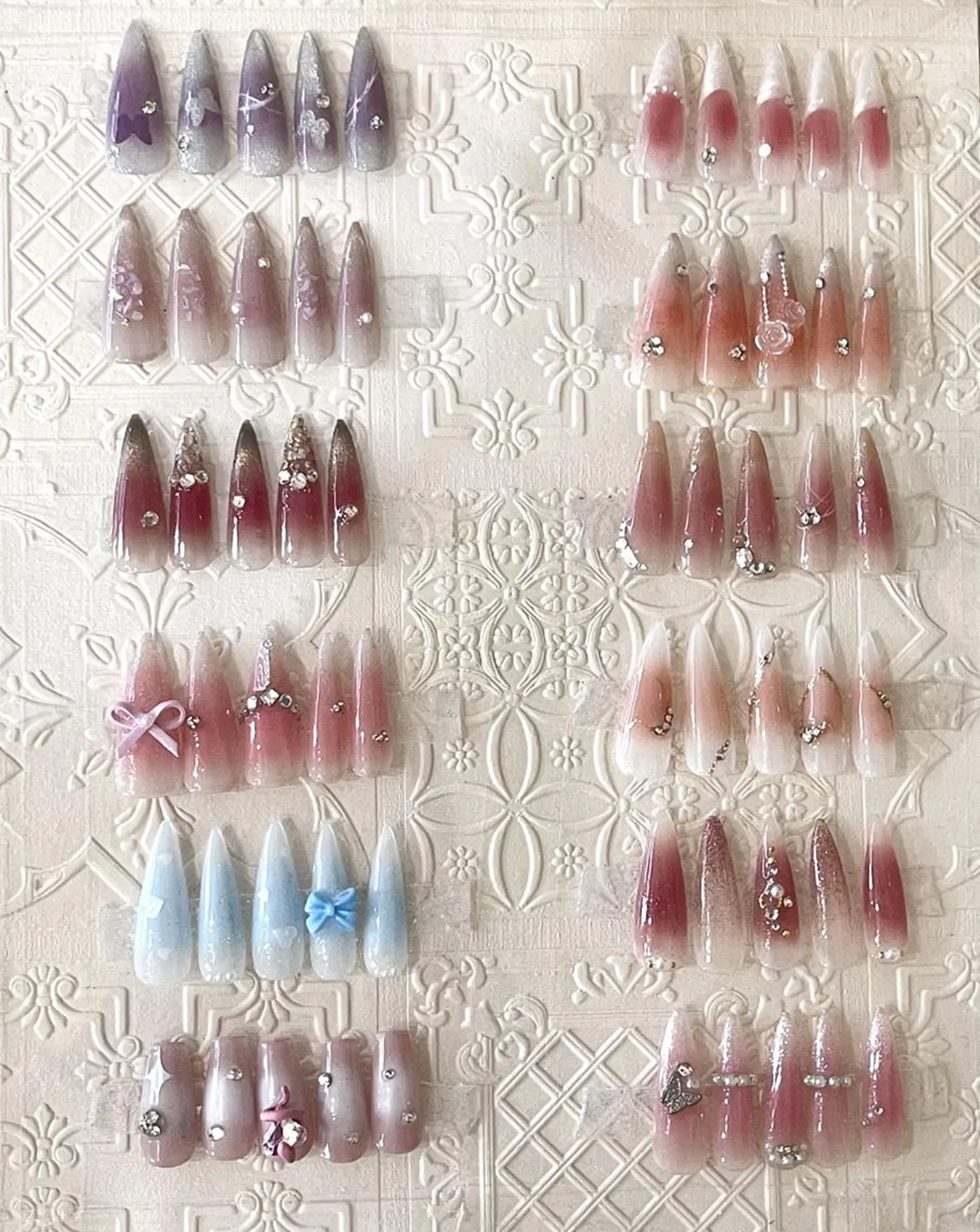 ネイル ハンドネイル RAFFINE 月🦋🩵のネイルデザイン
