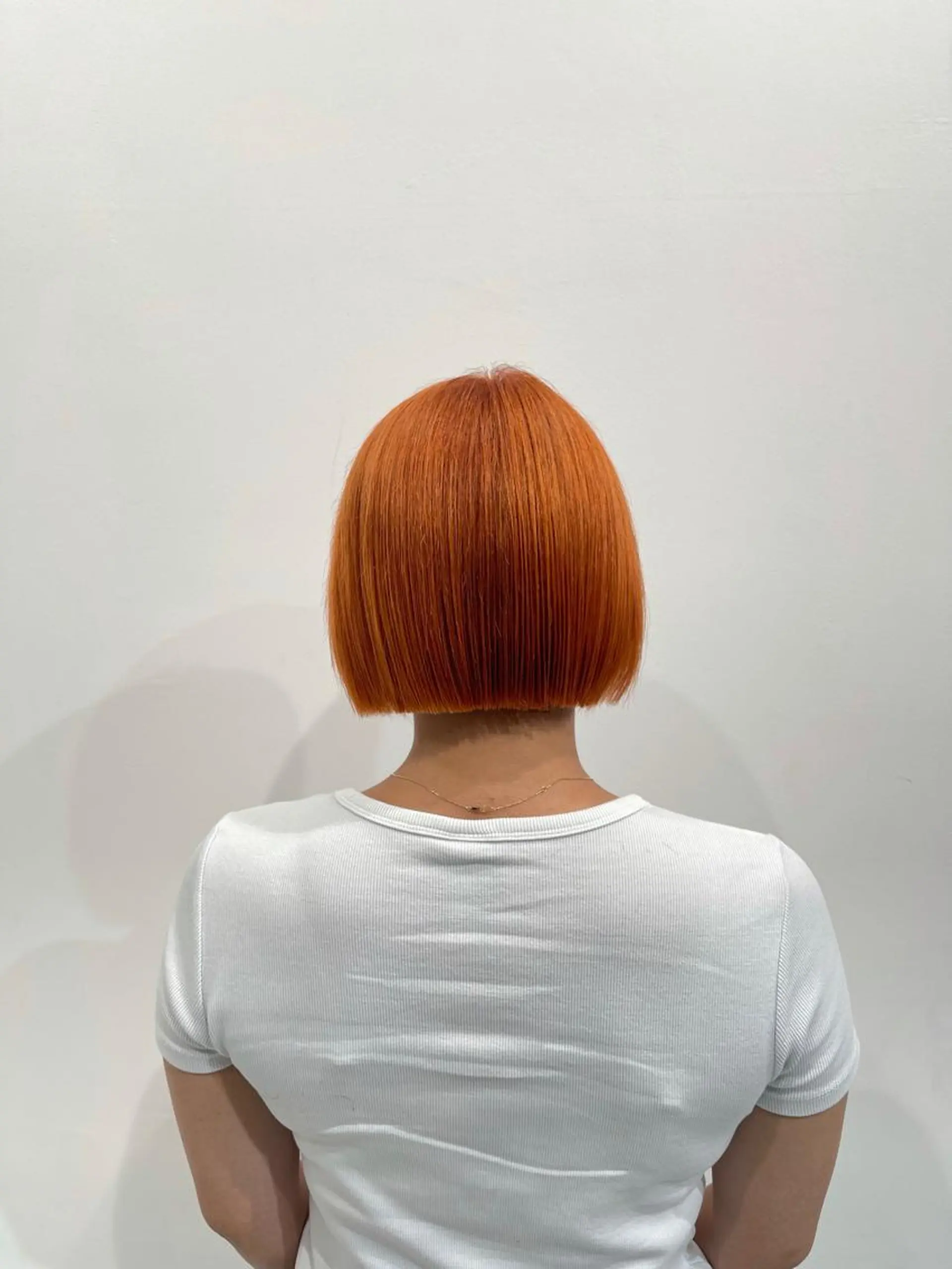 ショート カラー 切りっぱなしボブ オレンジ ボブ カット TAKUMI .のヘアスタイル