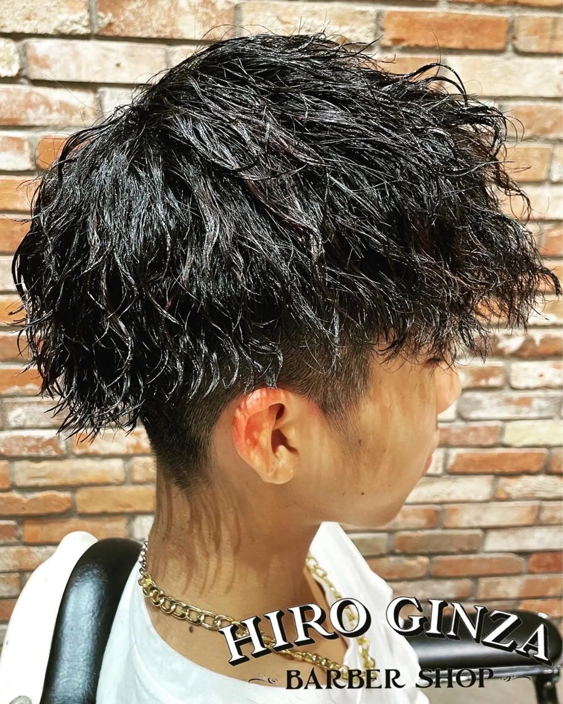 ミディアム パーマ ヘアアレンジ メンズ ミディアムパーマ メンズパーマ ツイストスパイラルパーマ スパイラルパーマ ヒロ銀座BARBERSHOP丸の内店所属・ヒロ銀座　石川 昂のヘアスタイル