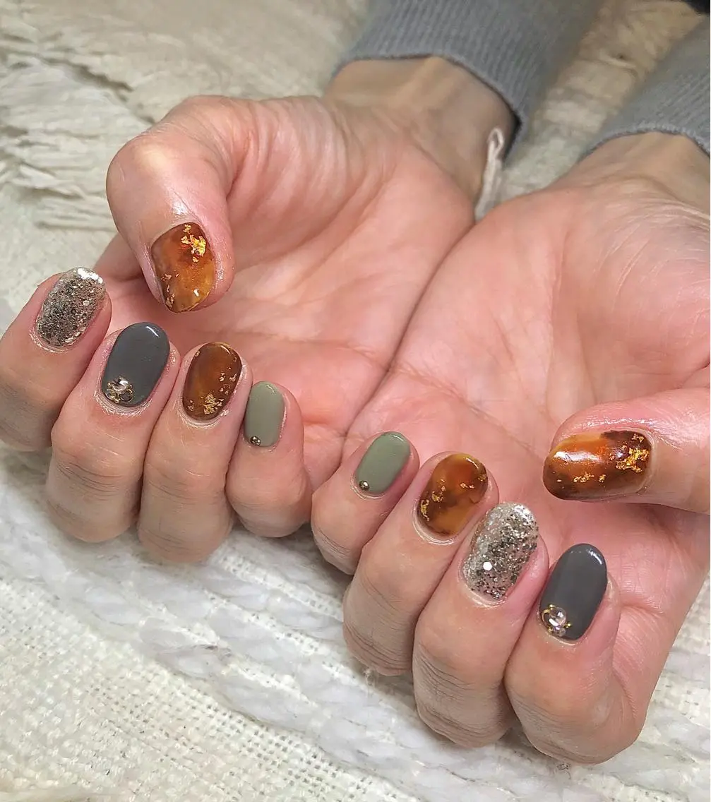 カラー パーマ ヘアアレンジ メンズ キッズ ネイル マツエク・マツパ べっ甲ネイル el. by Aoのネイルデザイン