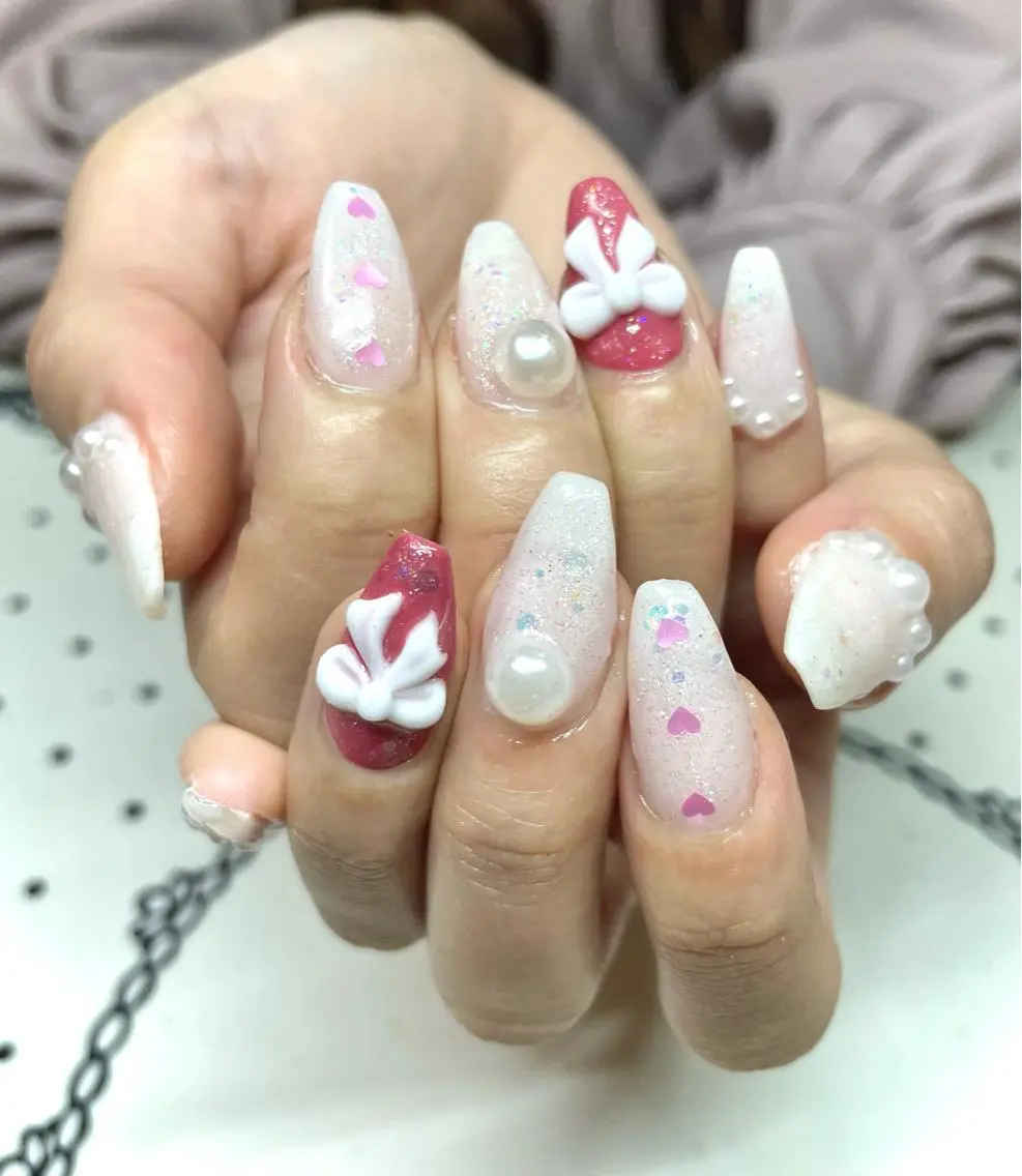 ネイル リボン ハンドネイル nailist cocoのネイルデザイン