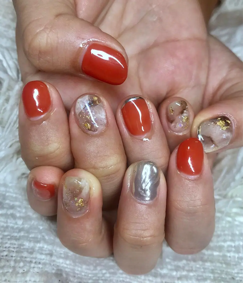 カラー パーマ ヘアアレンジ メンズ キッズ ネイル マツエク・マツパ テラコッタ ミラーネイル el. by Aoのネイルデザイン