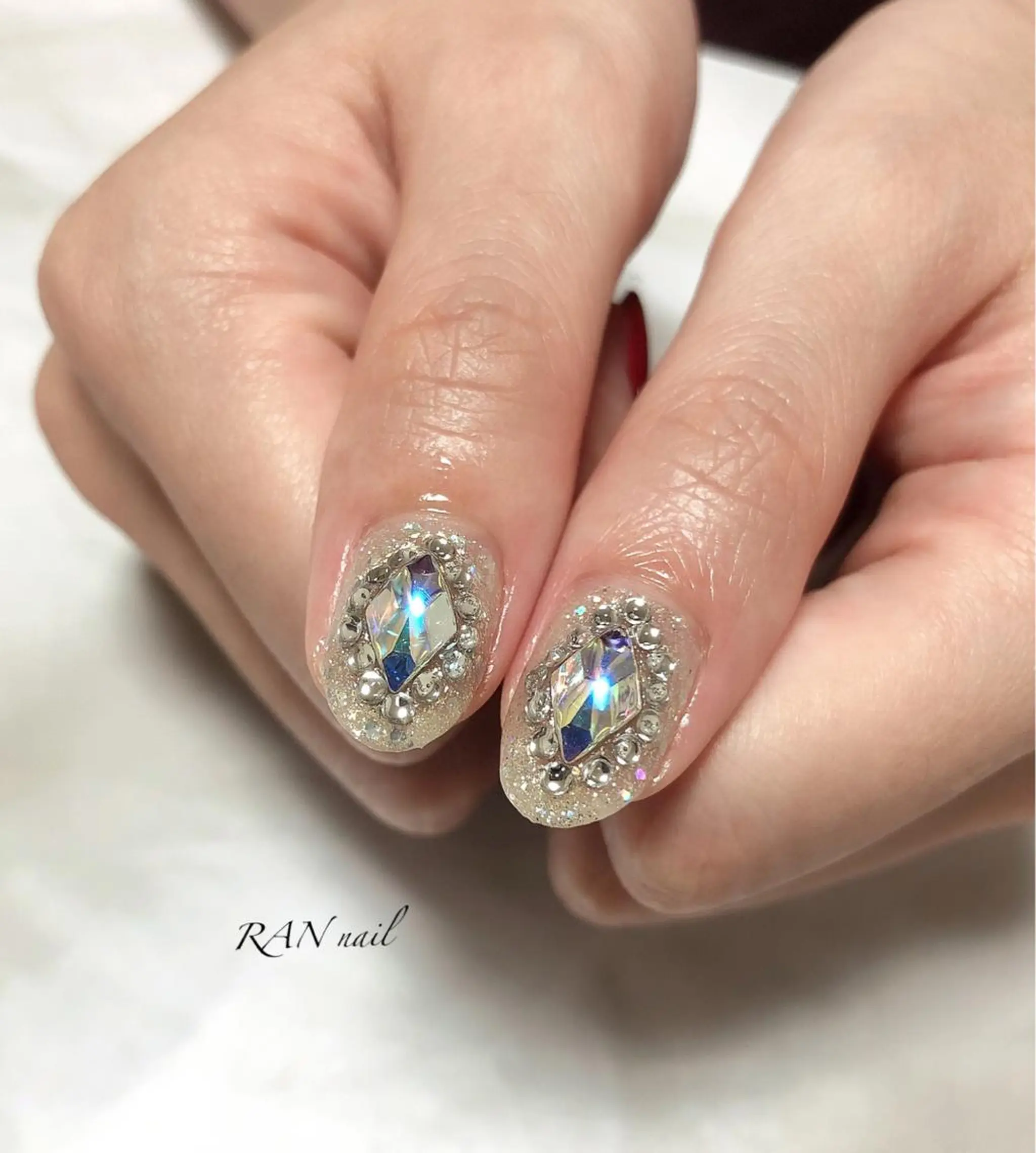 ネイル オーロラネイル クリアネイル 成人式 フットネイル キラキラネイル ハンドネイル フットネイル RAN nail 〜ランネイル〜所属・RAN nailのネイルデザイン