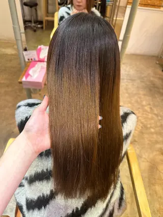 金 春江のヘアスタイル