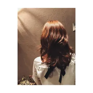 セミロング くるくるパーマ aikoのヘアスタイル
