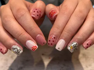 ネイル mellow:ｸﾙﾐ ﹡˖˟༝🎀˖˟ ༝のネイルデザイン