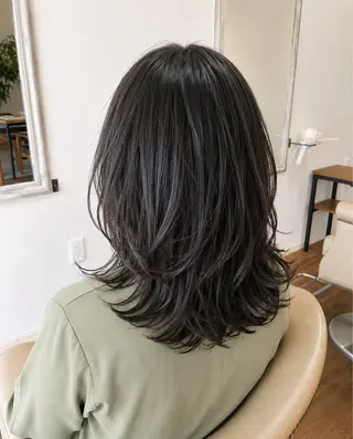 セミロング パーマ Nina by Babyloneのヘアスタイル