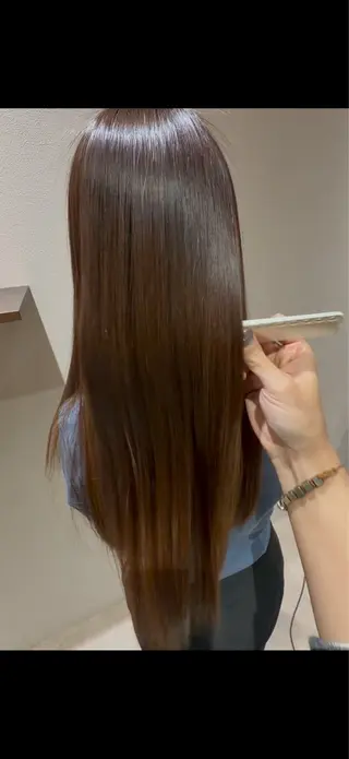 ロング クニサダ トウアのヘアスタイル
