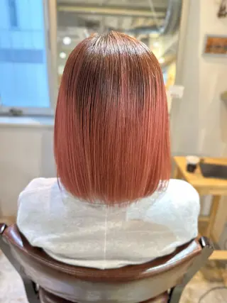 金 春江のヘアスタイル