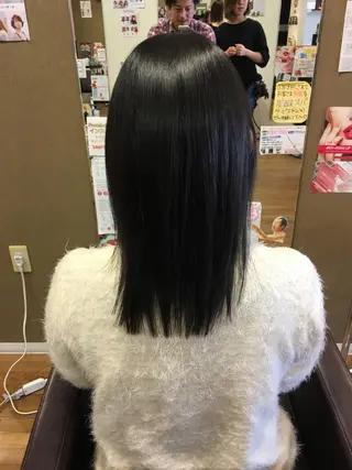 セミロング パーマ CALMHAIR 五十實淳のヘアスタイル