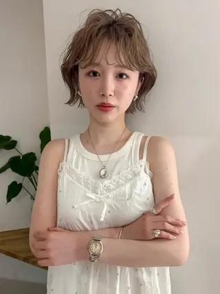 ショート パーマ 切りっぱなしボブ レイヤー/縮毛矯正のヘアスタイル