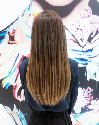 ロング パーマ 趙 英来のヘアスタイル