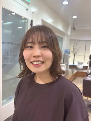 ミディアム パーマ Poche 丸山 愛万音のヘアスタイル