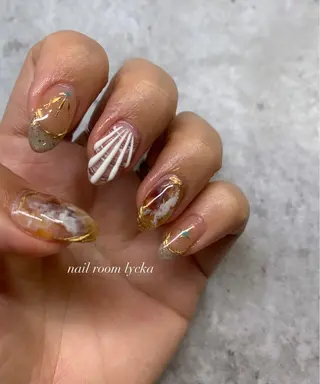 ネイル ネイルルームリッカ 𝐦𝐚𝐲𝐮のネイルデザイン