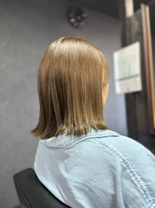 ミディアム 安田 恵のヘアスタイル