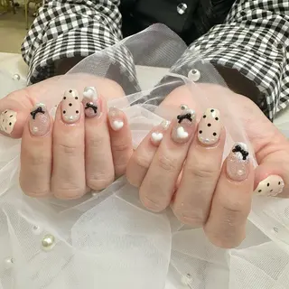 ネイル nami🐰🎀 ガーリー/堺筋本町のネイルデザイン
