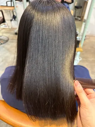 金 春江のヘアスタイル