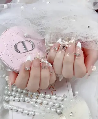 ロング E🌷nail 長さだし専門店のネイルデザイン