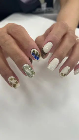 ネイル Tomo 🦋💜のネイルデザイン