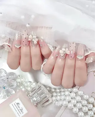 ロング E🌷nail 長さだし専門店のネイルデザイン