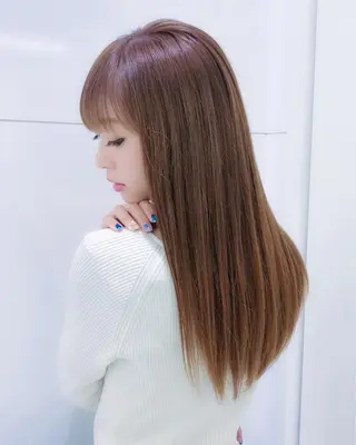 ロング パーマ 趙 英来のヘアスタイル