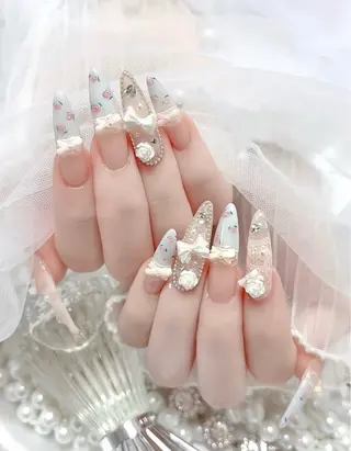 ロング E🌷nail 長さだし専門店のネイルデザイン