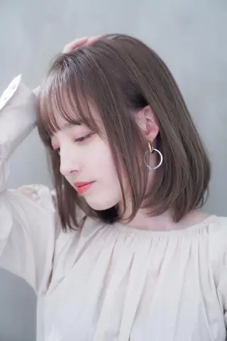 ミディアム HITOMI .のヘアスタイル