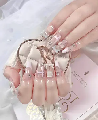 ロング E🌷nail 長さだし専門店のネイルデザイン