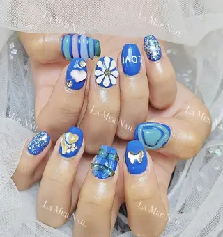 ネイル 🌻 Momoko_のネイルデザイン
