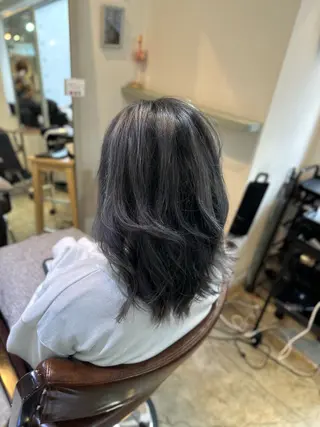 金 春江のヘアスタイル