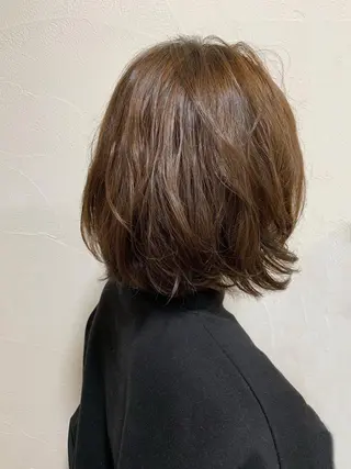 ショート パーマ 佐藤 芽依のヘアスタイル