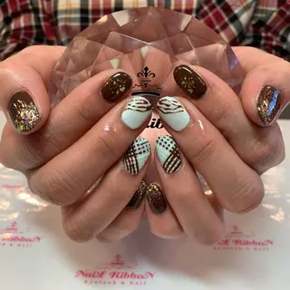 ネイル ネイルリボン 受付スタッフのネイルデザイン
