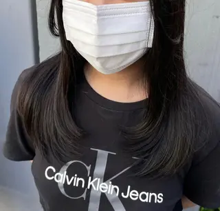 ロング MIFA レイヤー／パーマのヘアスタイル