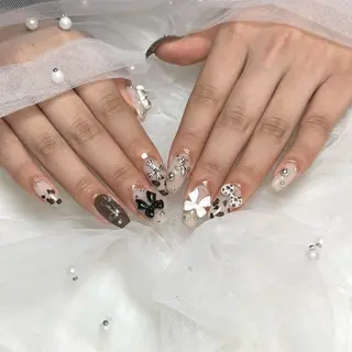 ネイル 【UNE.】 長さだしフィルインのネイルデザイン
