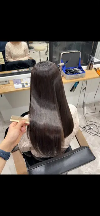 ロング 黒阪 なみのヘアスタイル