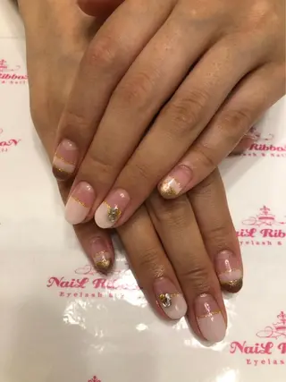 ネイル ネイルリボン 受付スタッフのネイルデザイン